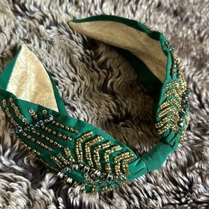 Green NamJosh headband with gold sequin design